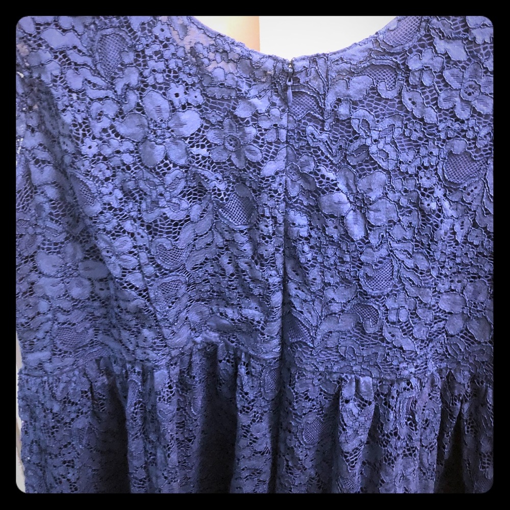 The dress is blue like the first photo size 18